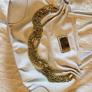 All white and gold baby phat fake leather purse